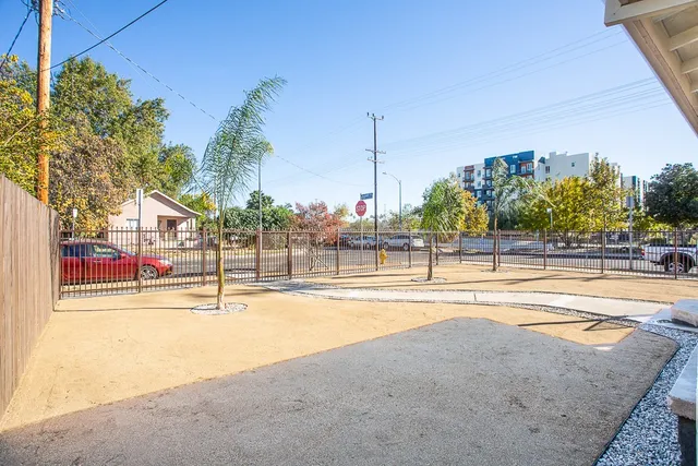 a view of a swimming pool with a lawn chairs