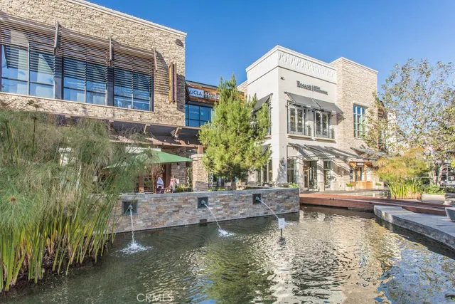 a view of houses with swimming pool