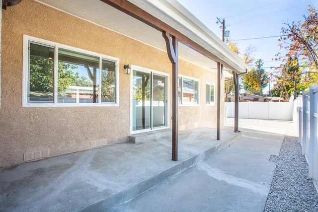 a view of a big room with large windows