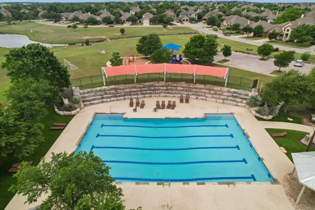 a view of a park with swings