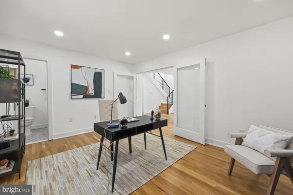 a kitchen with stainless steel appliances a sink stove and refrigerator