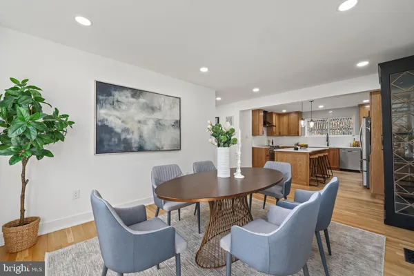 a view of entryway with a window and wooden floor