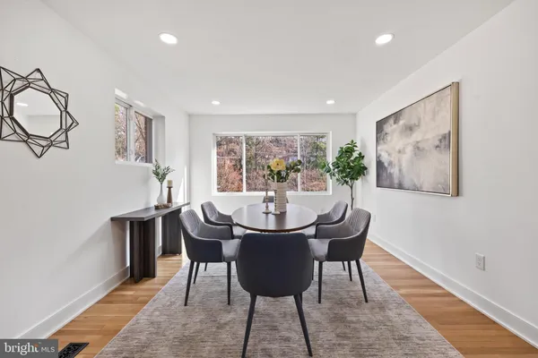 a bathroom with a bathtub a toilet and a shower