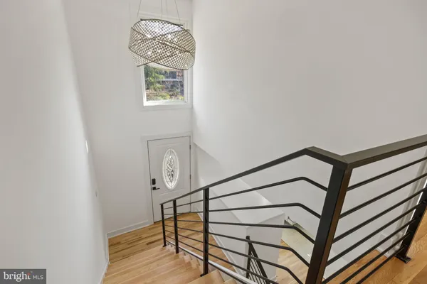 a bathroom with a sink a mirror and a toilet