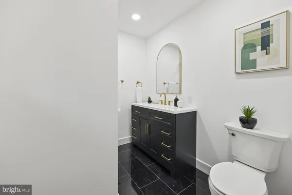 a bathroom with a shower and a sink