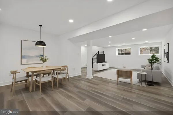 a view of room with wooden floor and window