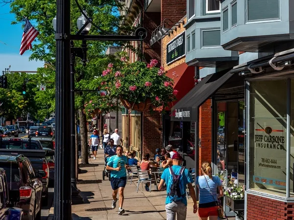 a view of street with sitting area