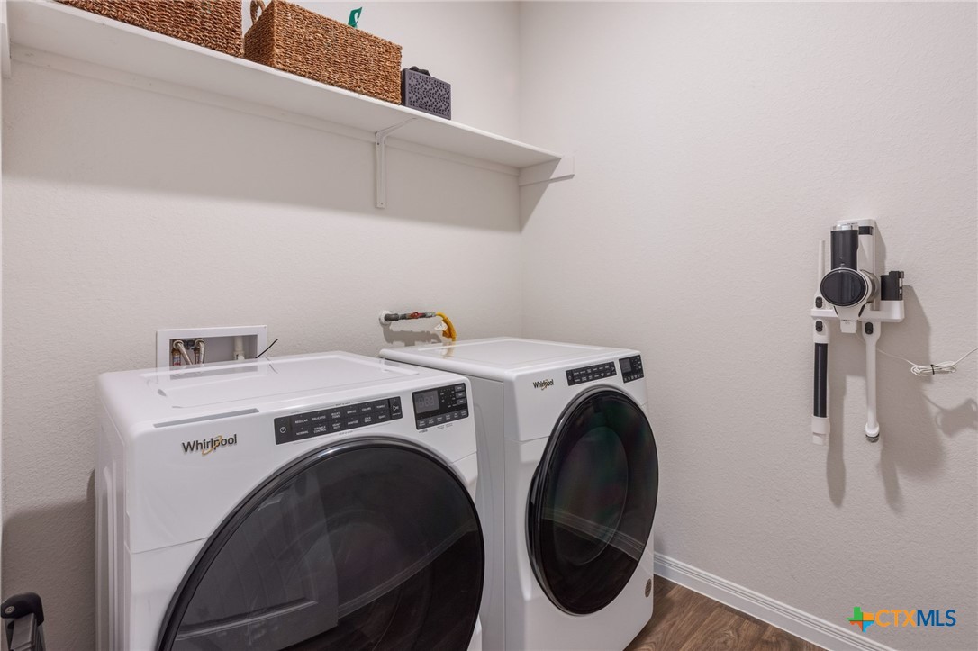 205 Charles Trail Georgetown, TX 78626 - Photo 26 of 38 a utility room with dryer and washer