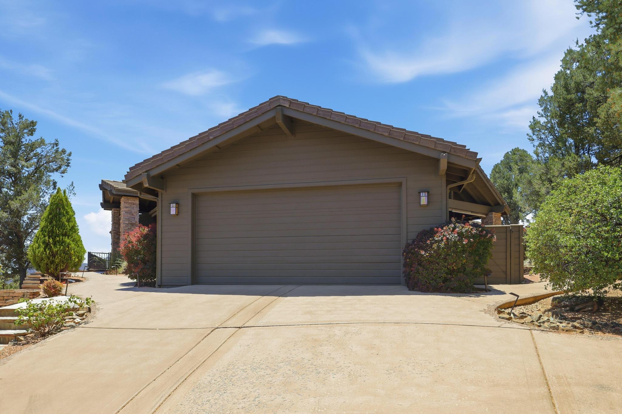 2908 East Rim Club Drive Payson, AZ 85541 - Photo 3 of 77 a front view of a house with a garage
