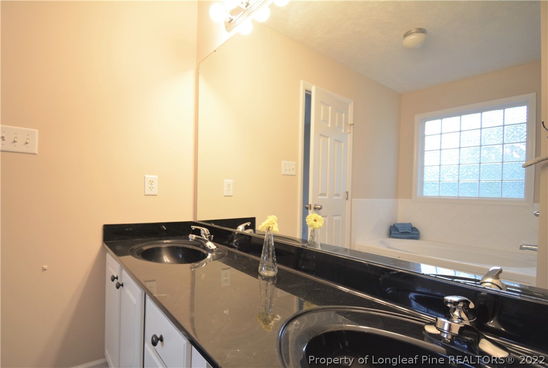 4308 Rocinta Court Hope Mills, NC 28348 - Photo 12 of 23 a kitchen with a sink and a window