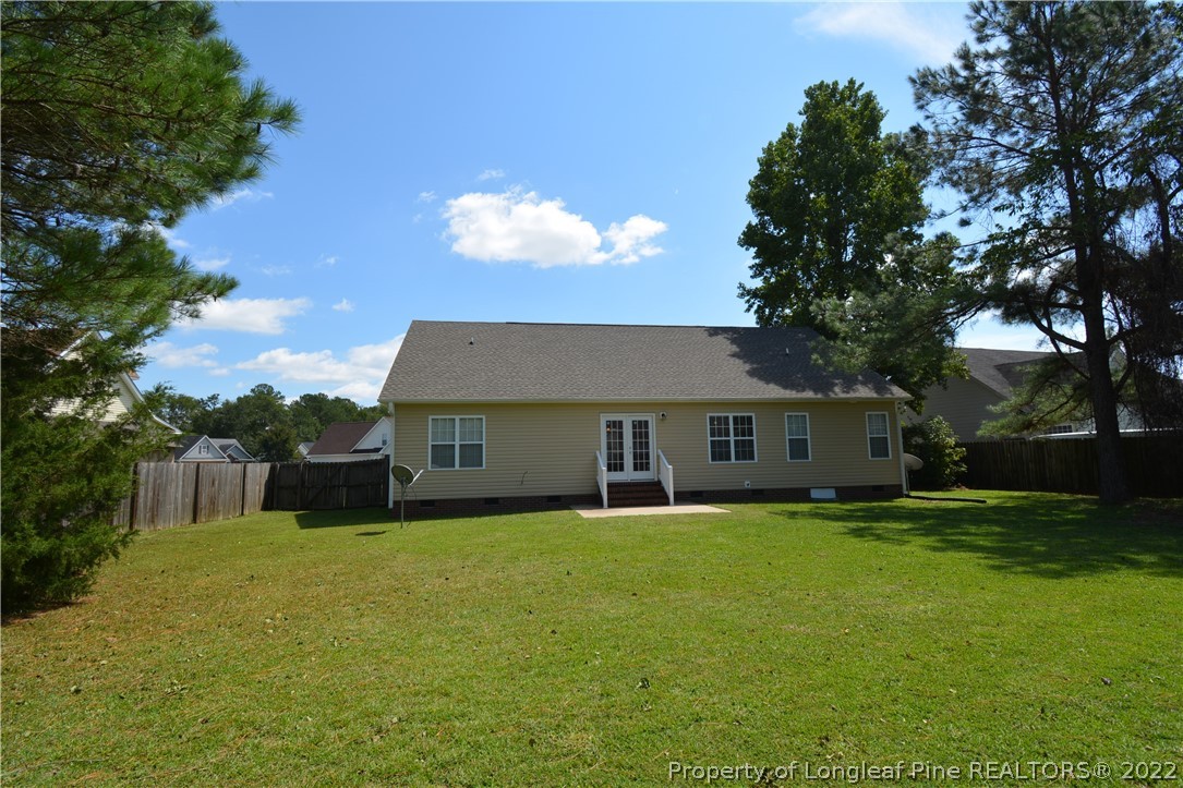 4308 Rocinta Court Hope Mills, NC 28348 - Photo 22 of 23 front view of a house with a yard