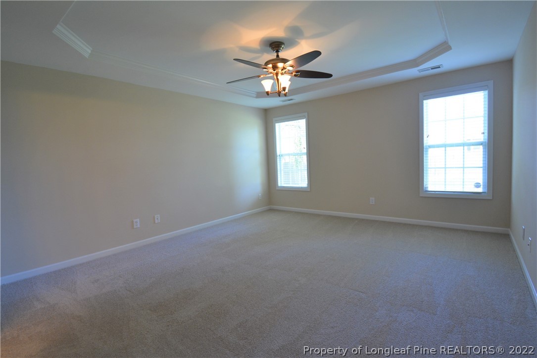 4308 Rocinta Court Hope Mills, NC 28348 - Photo 10 of 23 a view of a livingroom with a ceiling fan and window