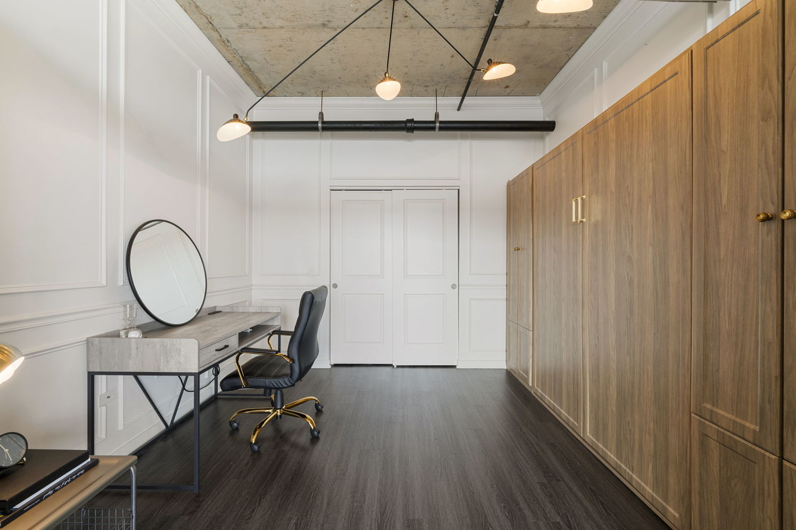 50 East 16th Street, Unit 1405 Chicago, IL 60616 - Photo 16 of 36 a view of a room with furniture and wooden floor