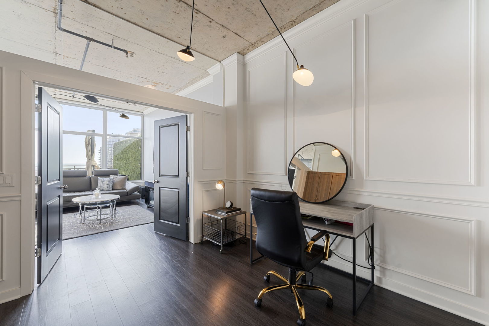 50 East 16th Street, Unit 1405 Chicago, IL 60616 - Photo 17 of 36 a view of a workspace with furniture and wooden floor