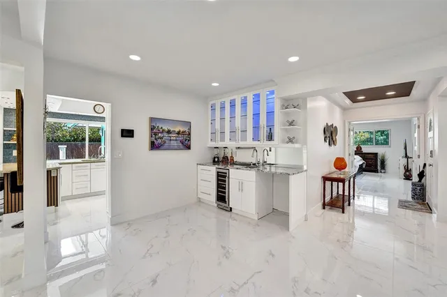 a view of workspace with furniture and window