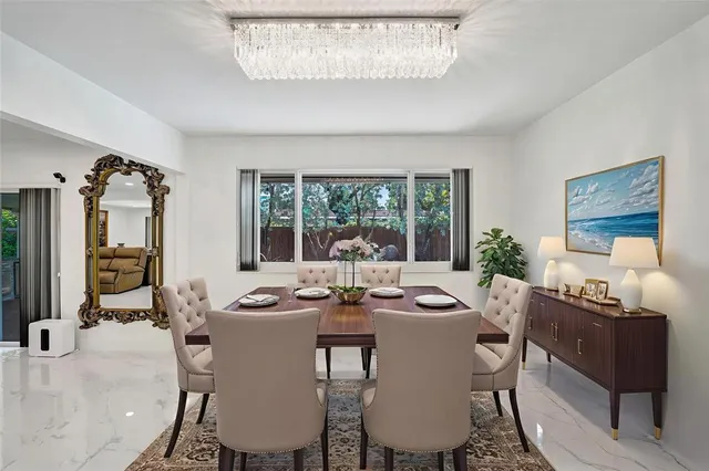 a spacious bathroom with a sink a mirror and a shower