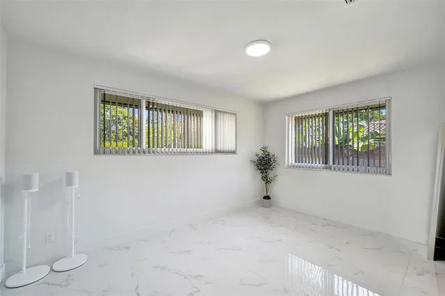 a view of a house with a garden