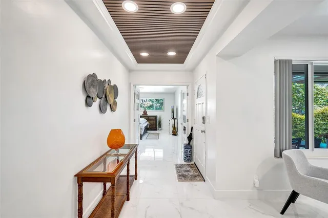 a bathroom with a sink a bathtub and a mirror