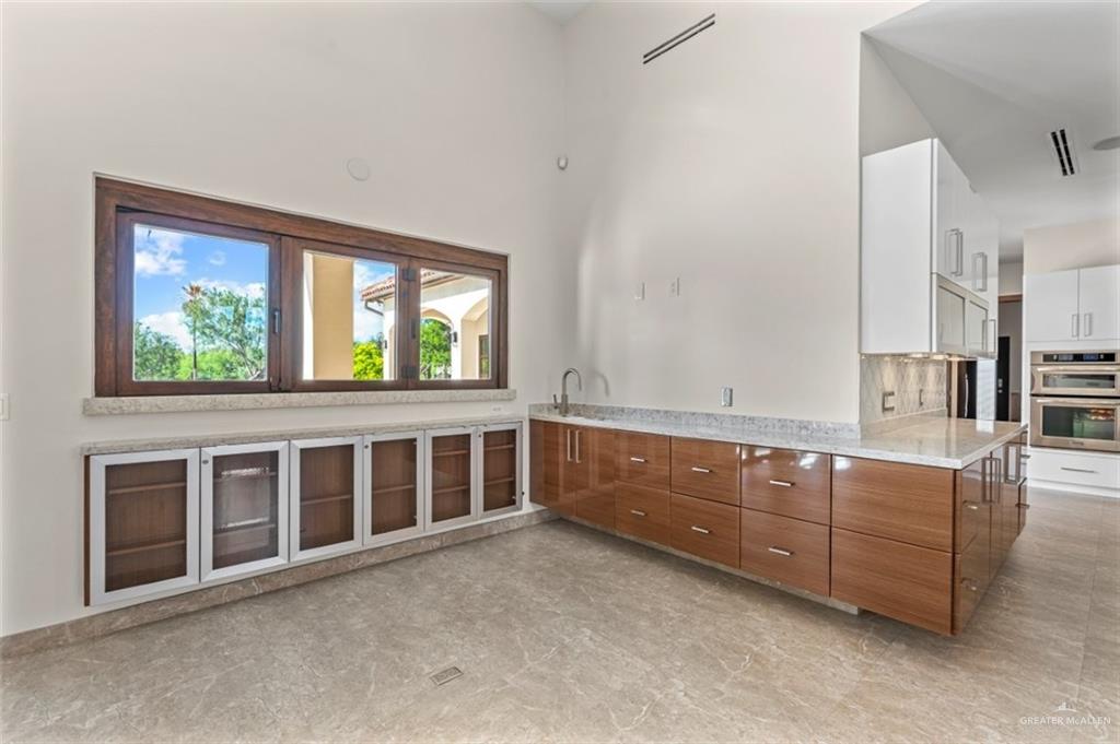 1421 Encanto Road, Unit SERVICE Weslaco, TX 78596 - Photo 21 of 37 a view of an empty room with window