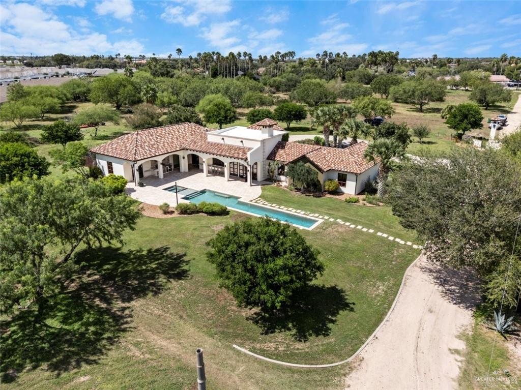 1421 Encanto Road, Unit SERVICE Weslaco, TX 78596 - Photo 3 of 37 an aerial view of multiple house