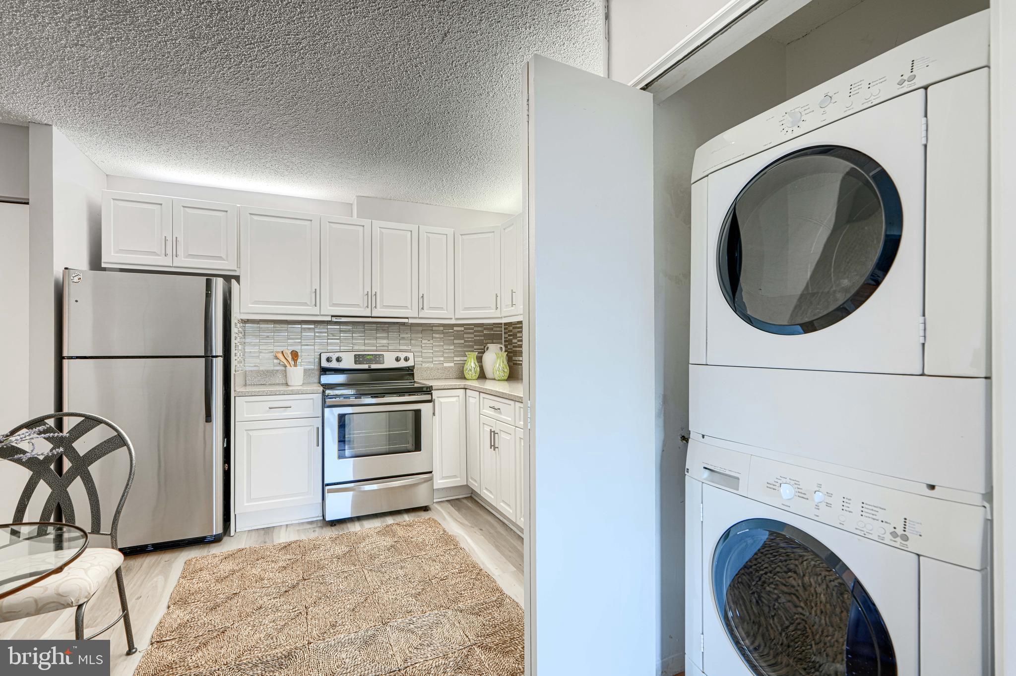 4100 North Charles Street, Unit 412 Baltimore, MD 21218 - Photo 11 of 56 Kitchen with full size front load laundry