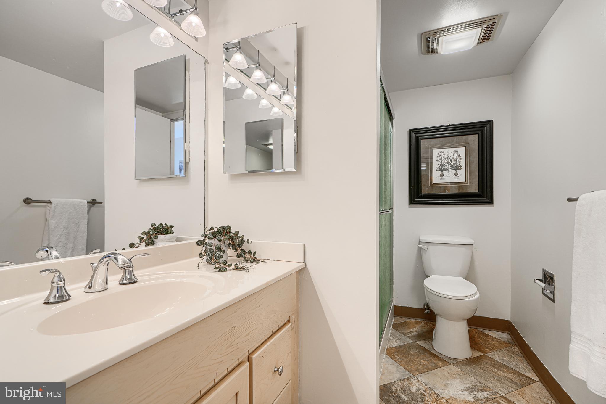 4100 North Charles Street, Unit 412 Baltimore, MD 21218 - Photo 30 of 56 Primary ensuite bathroom