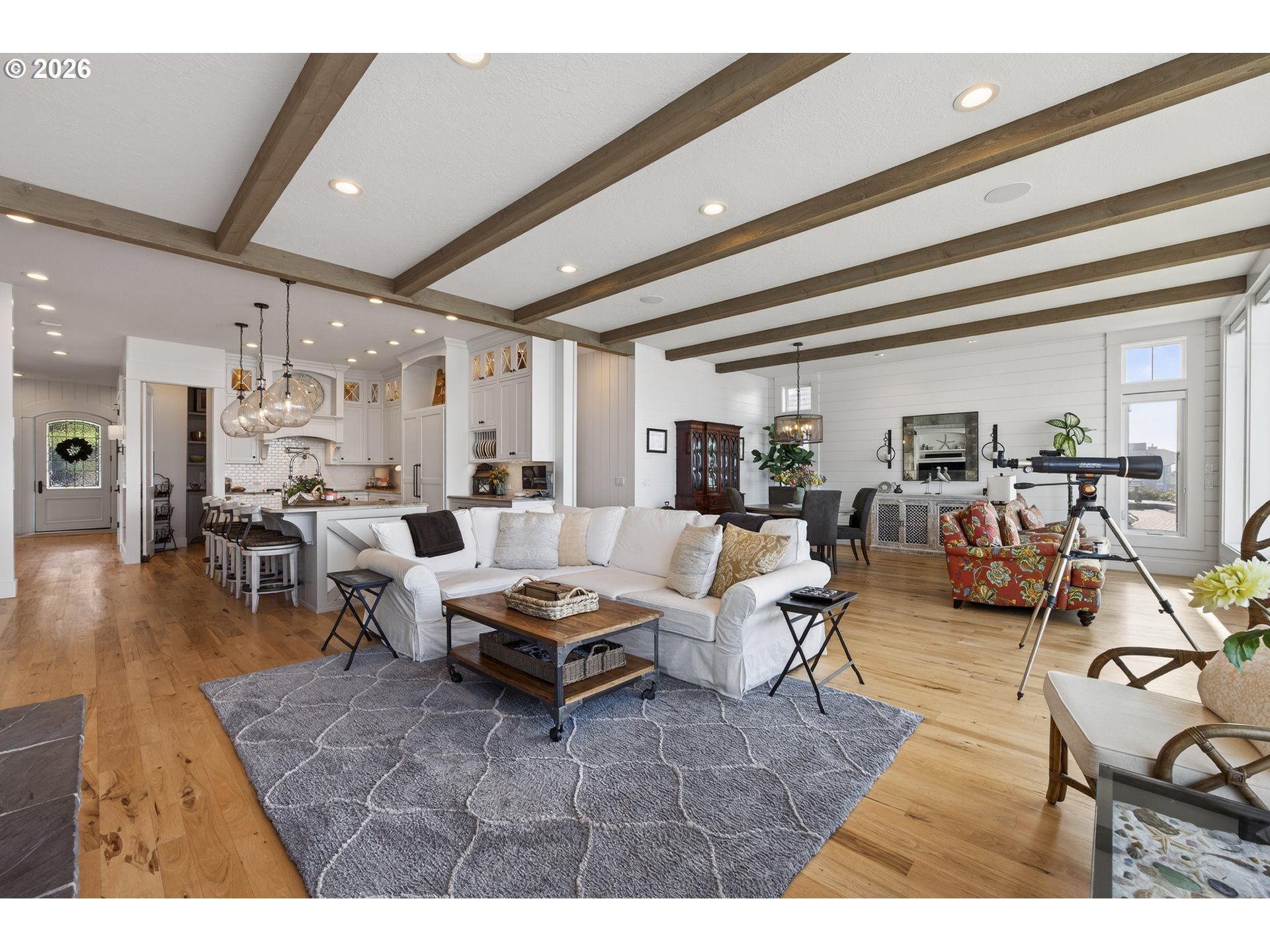 525 Point Avenue Depoe Bay, OR 97341 - Photo 15 of 47 a living room with lots of furniture and kitchen view