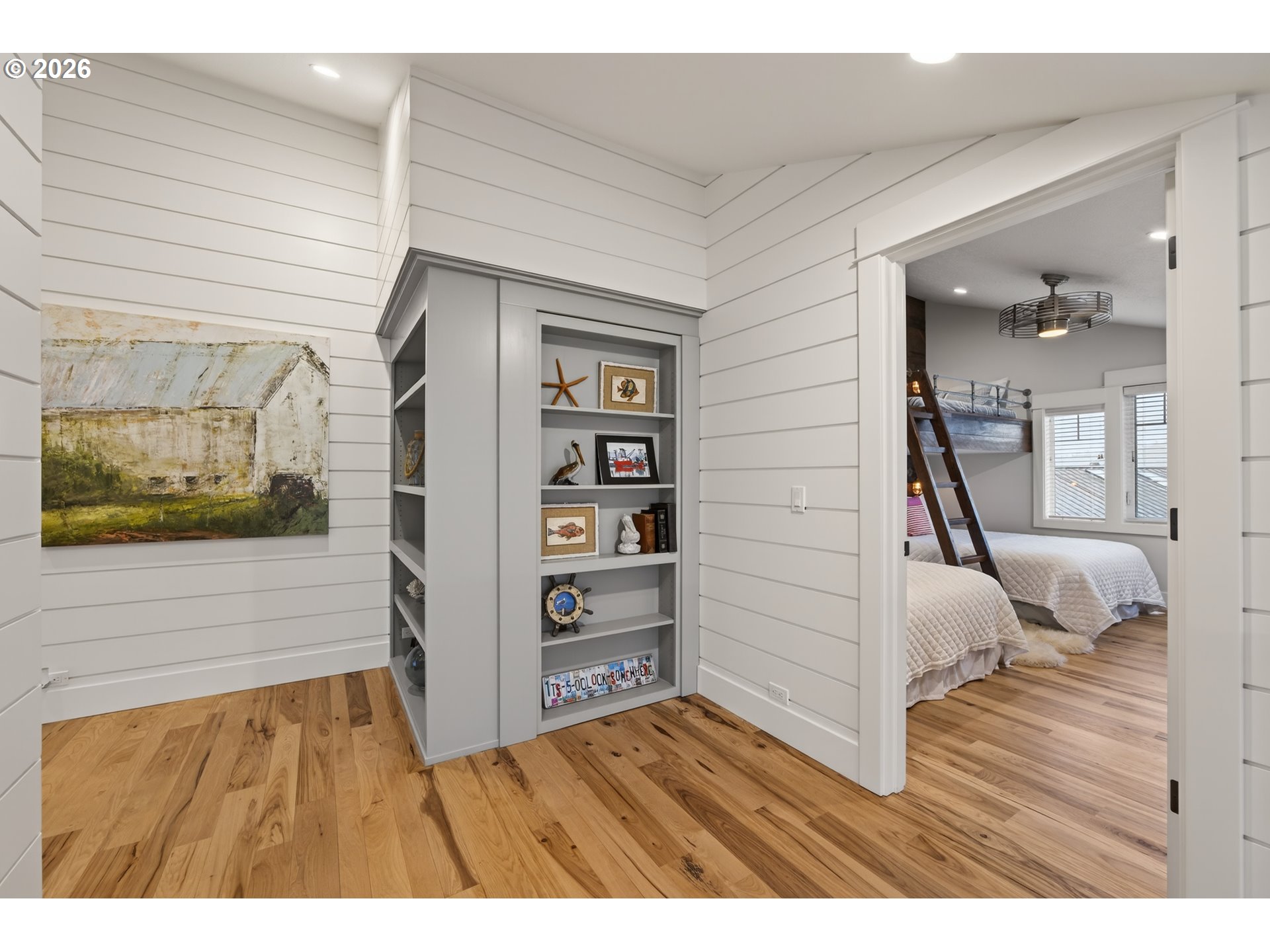 525 Point Avenue Depoe Bay, OR 97341 - Photo 23 of 47 a view of bedroom with a bed and wooden floor
