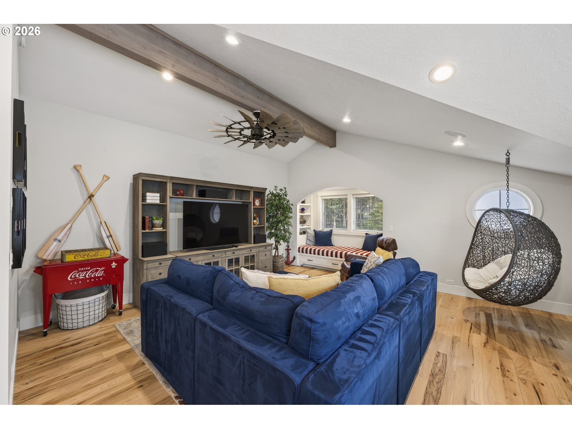 525 Point Avenue Depoe Bay, OR 97341 - Photo 28 of 47 a living room with furniture and a flat screen tv
