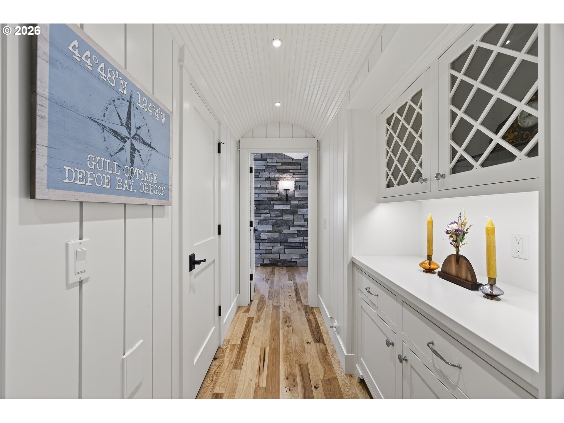 525 Point Avenue Depoe Bay, OR 97341 - Photo 33 of 47 a view of hallway with wooden floor