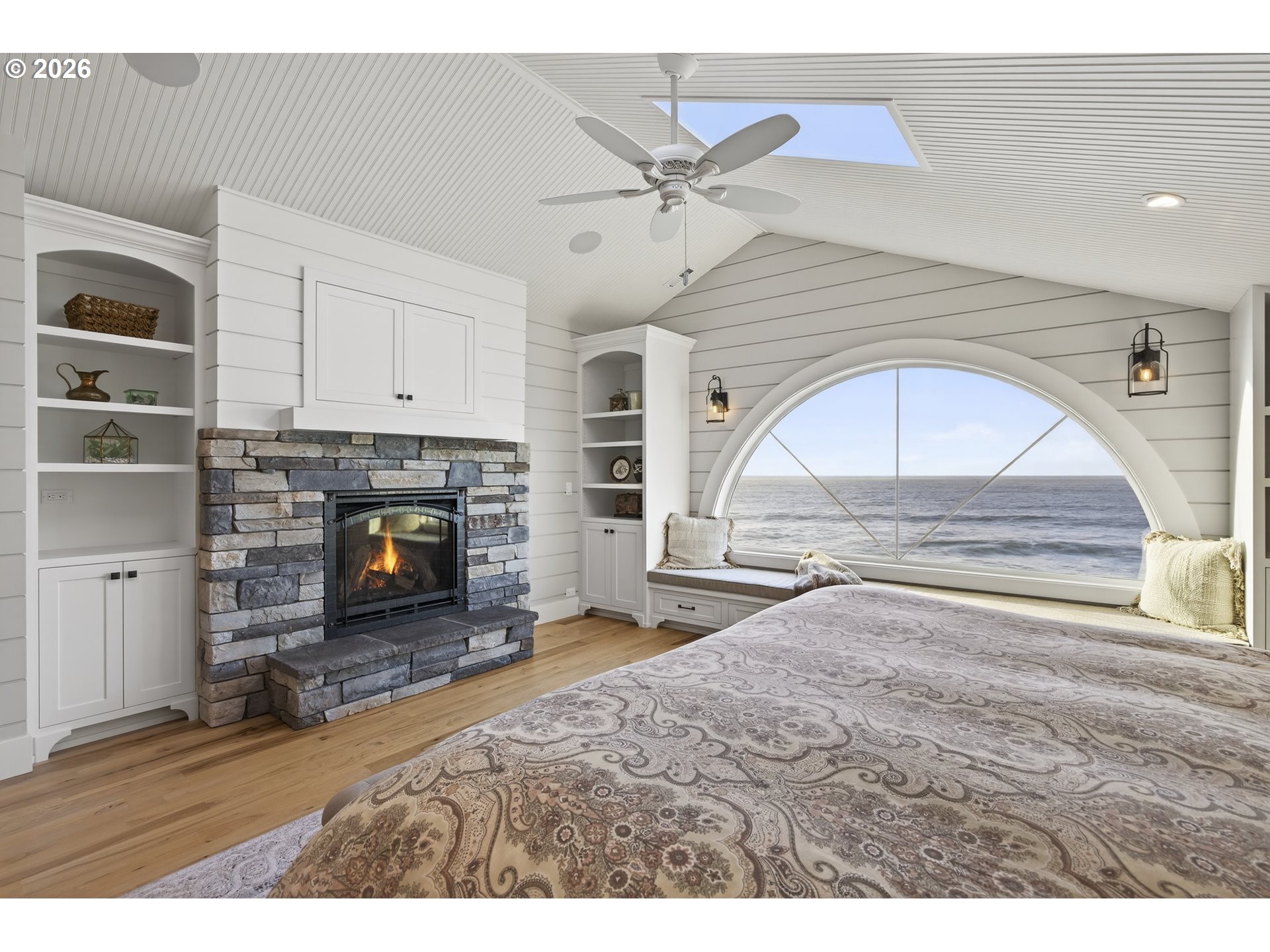 525 Point Avenue Depoe Bay, OR 97341 - Photo 35 of 47 a view of an empty room with a fireplace and a window
