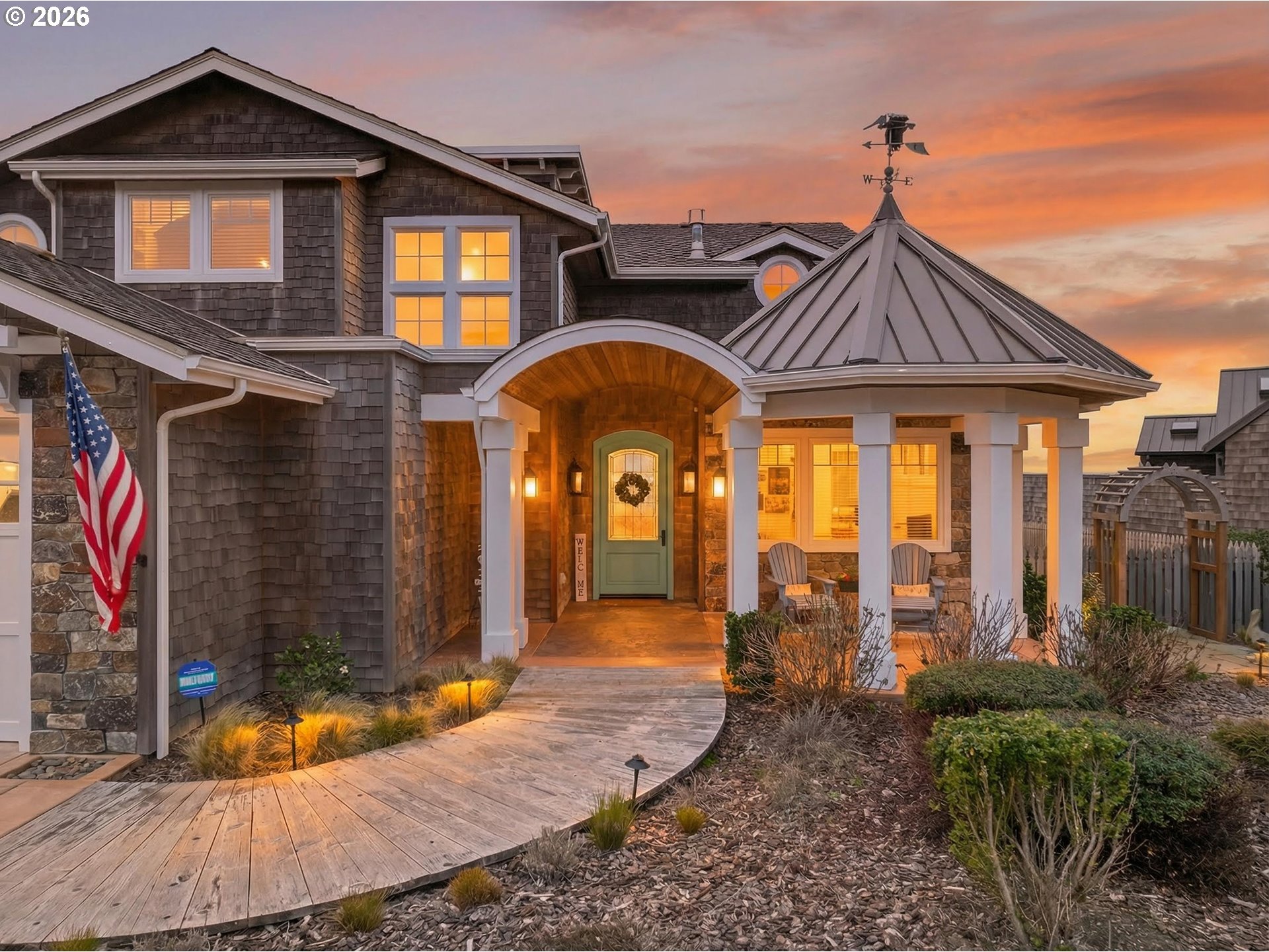 525 Point Avenue Depoe Bay, OR 97341 - Photo 4 of 47 a front view of a house with garden
