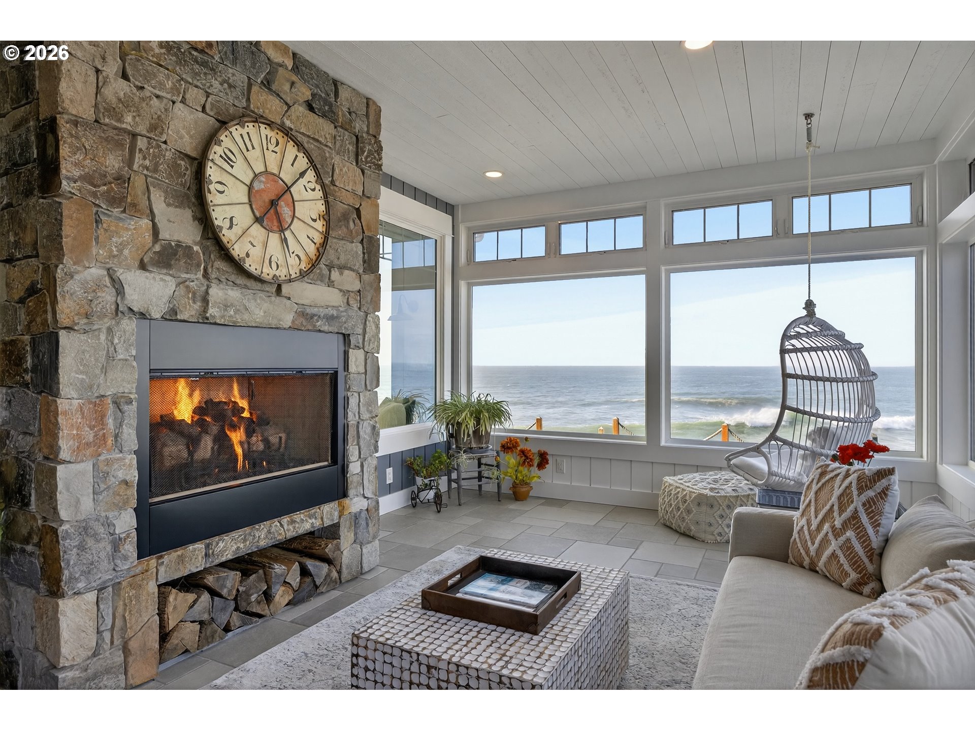 525 Point Avenue Depoe Bay, OR 97341 - Photo 8 of 47 a living room with furniture a rug and a flat screen tv