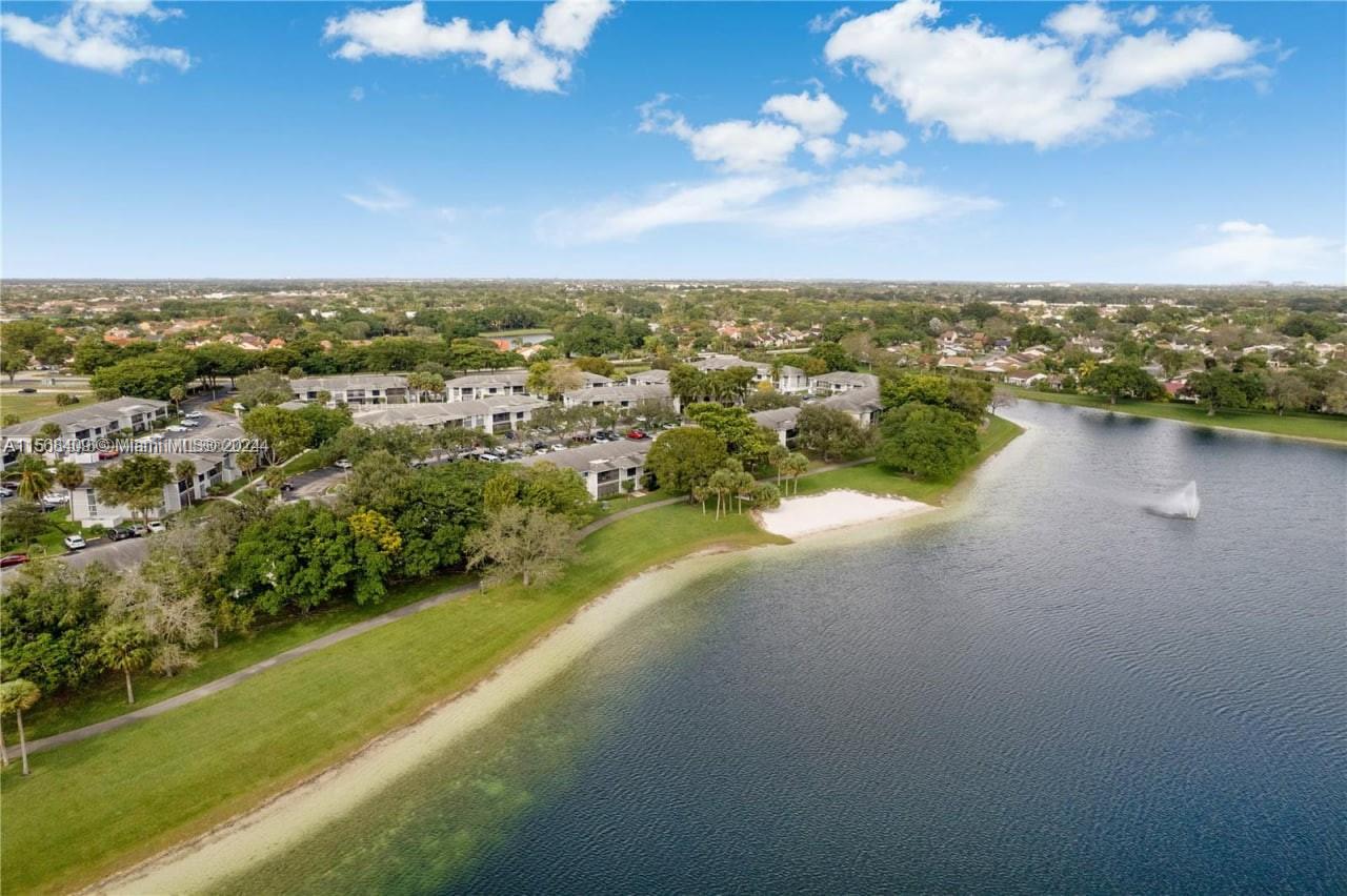9701 Hammocks Boulevard, Unit 108A Miami, FL 33196 - Photo 1 of 8 a view of a city with ocean view