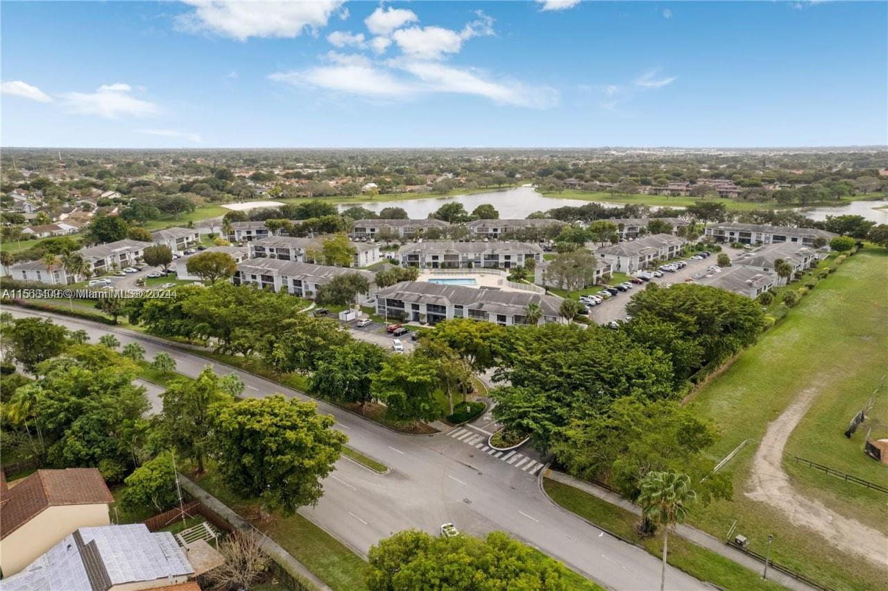 9701 Hammocks Boulevard, Unit 108A Miami, FL 33196 - Photo 2 of 8 an aerial view of multiple house