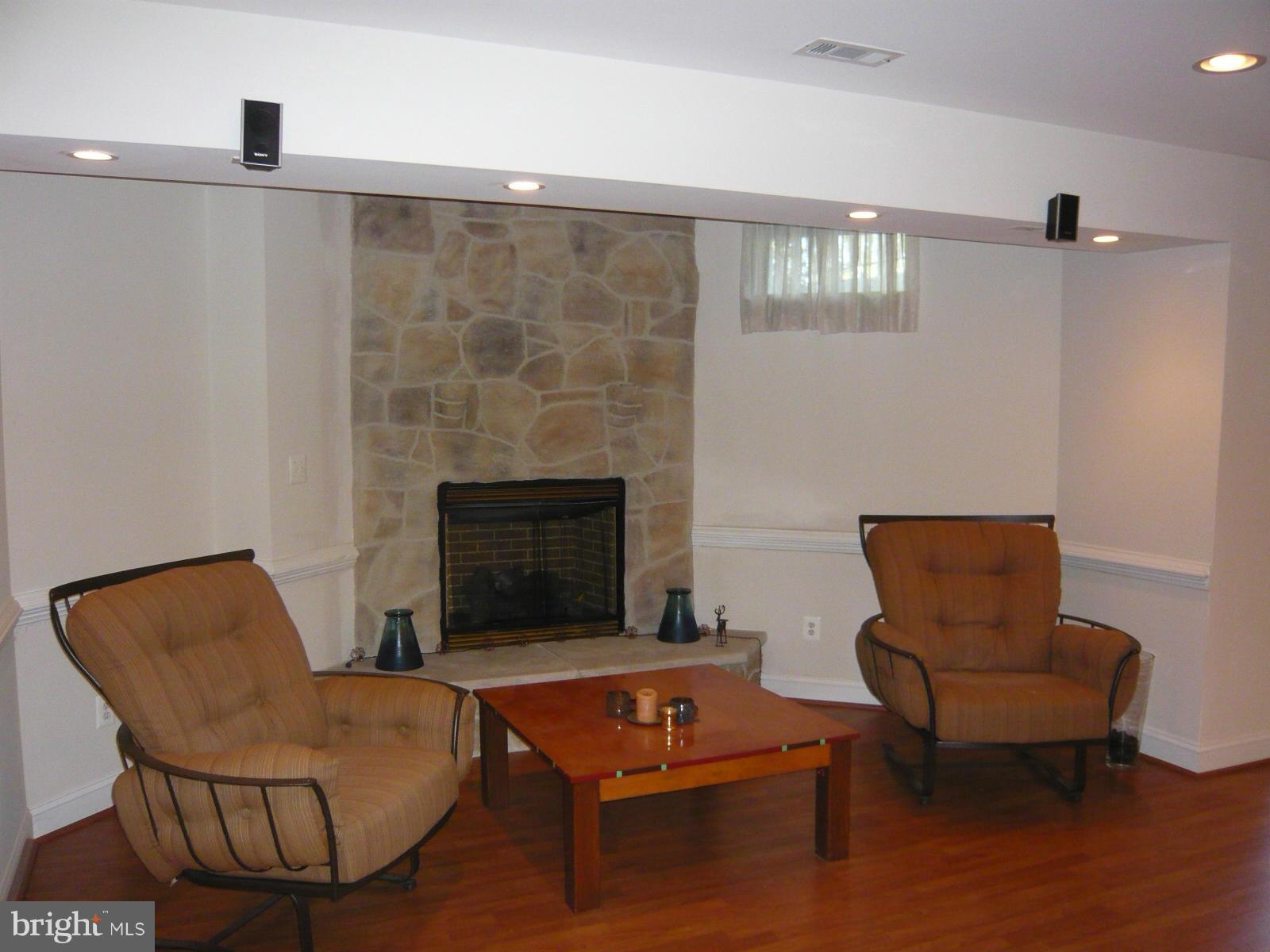 20618 Wilderness Run Road Boonsboro, MD 21713 - Photo 17 of 27 Finished basement with gas fireplace