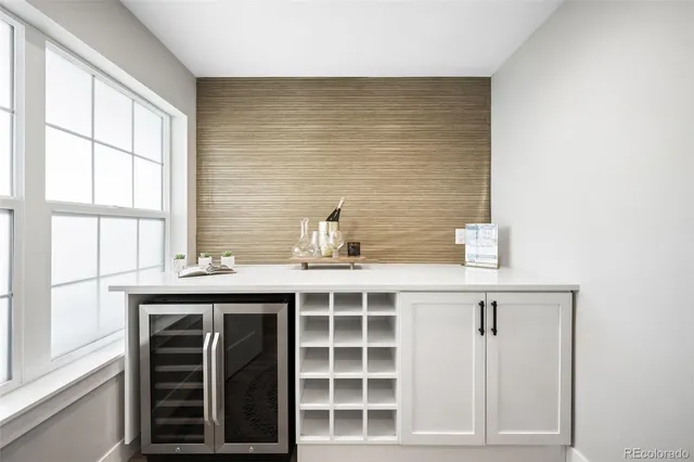 a bathroom with a sink and a window