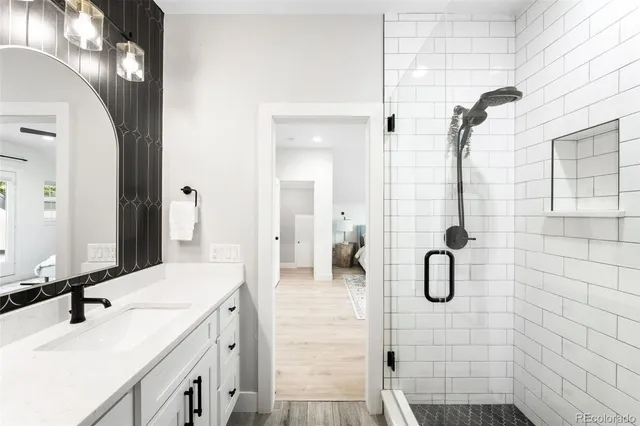 a bathroom with a sink and a mirror