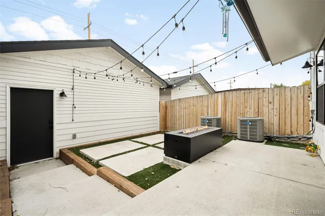 a building outdoor space with patio furniture