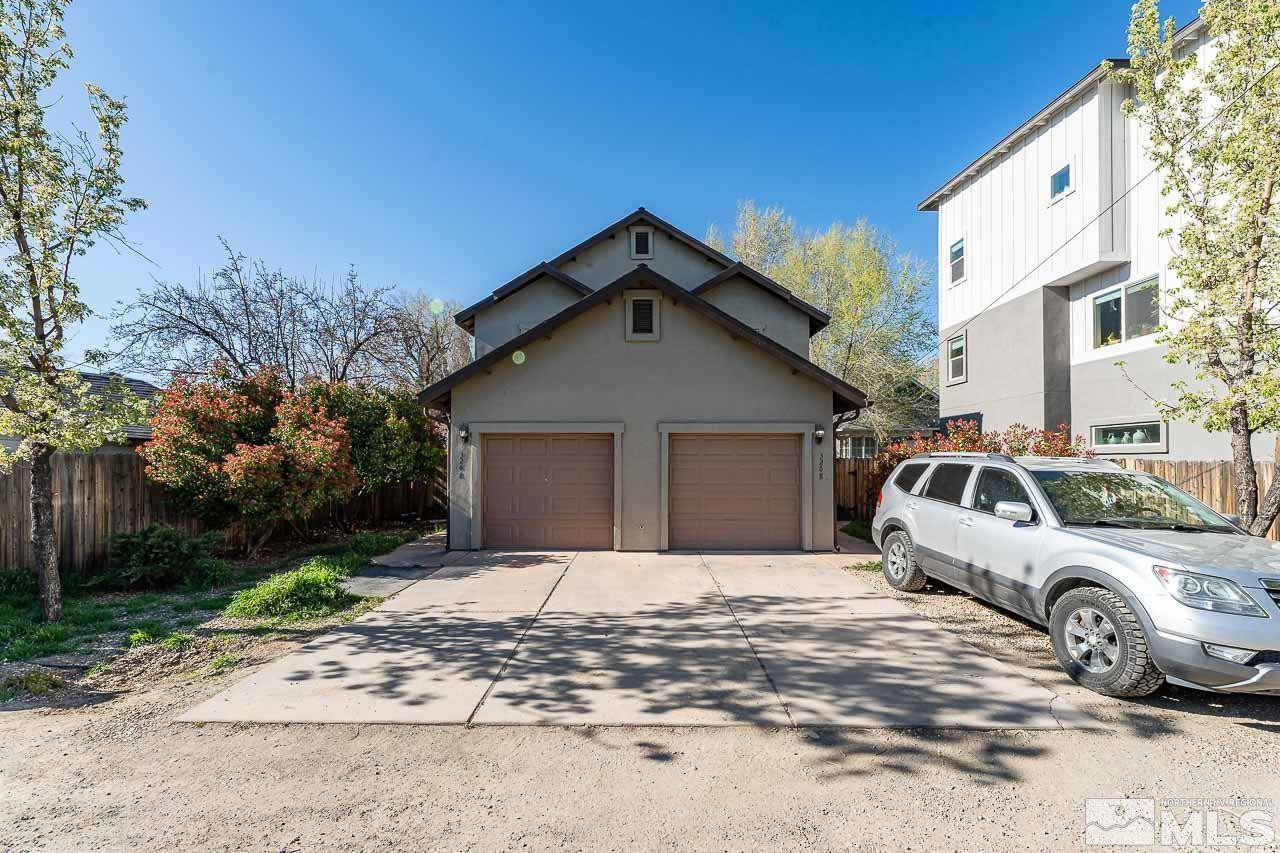 326 East 7th Street Reno, NV 89512 - Photo 14 of 21 a view of a white house and a yard