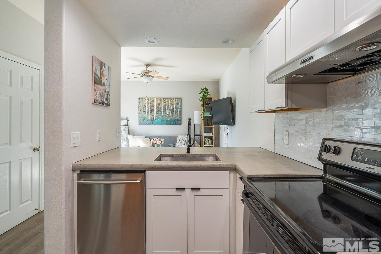 326 East 7th Street Reno, NV 89512 - Photo 4 of 21 a kitchen with a sink and cabinets