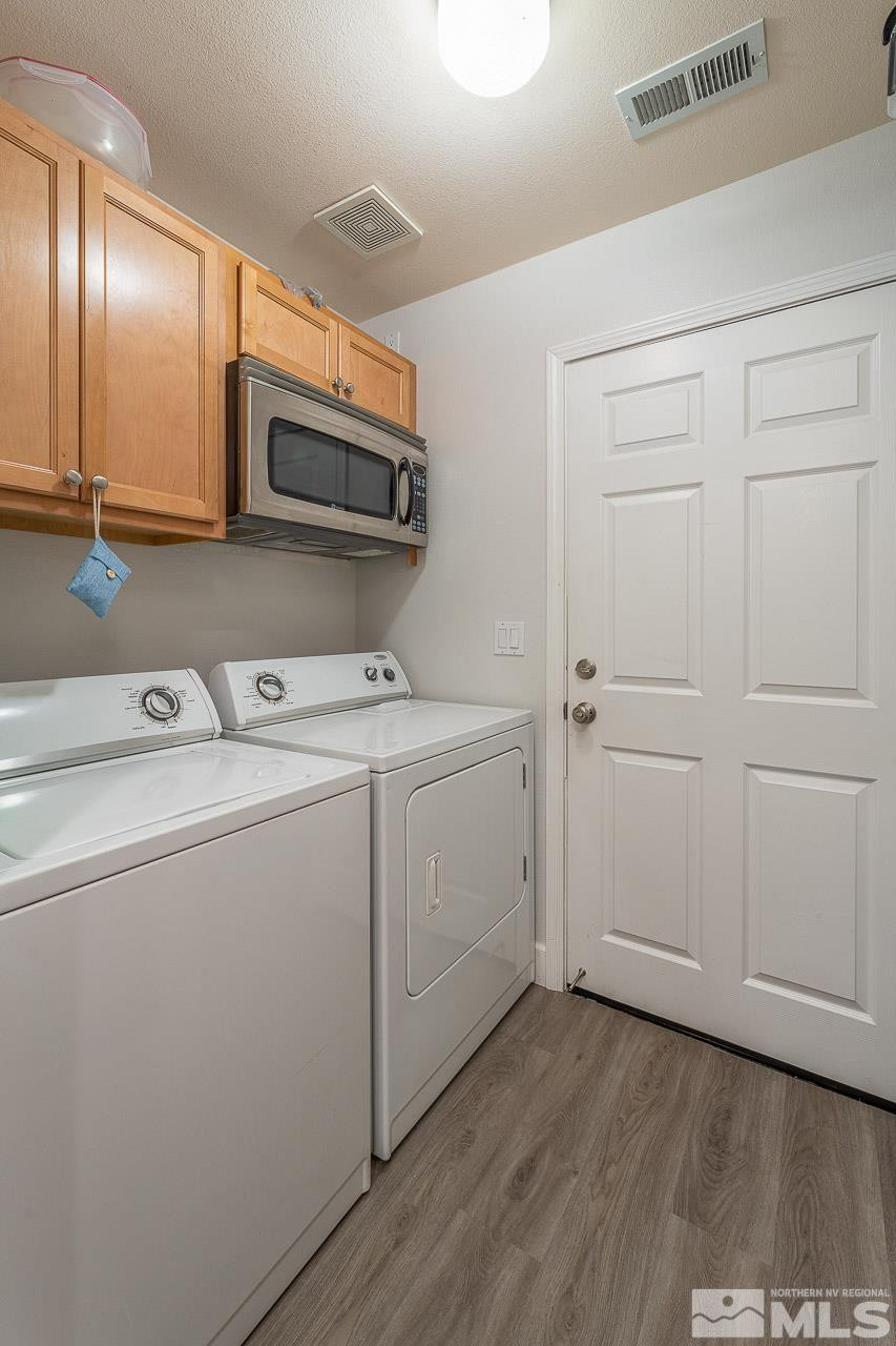 326 East 7th Street Reno, NV 89512 - Photo 7 of 21 a utility room with dryer and washer