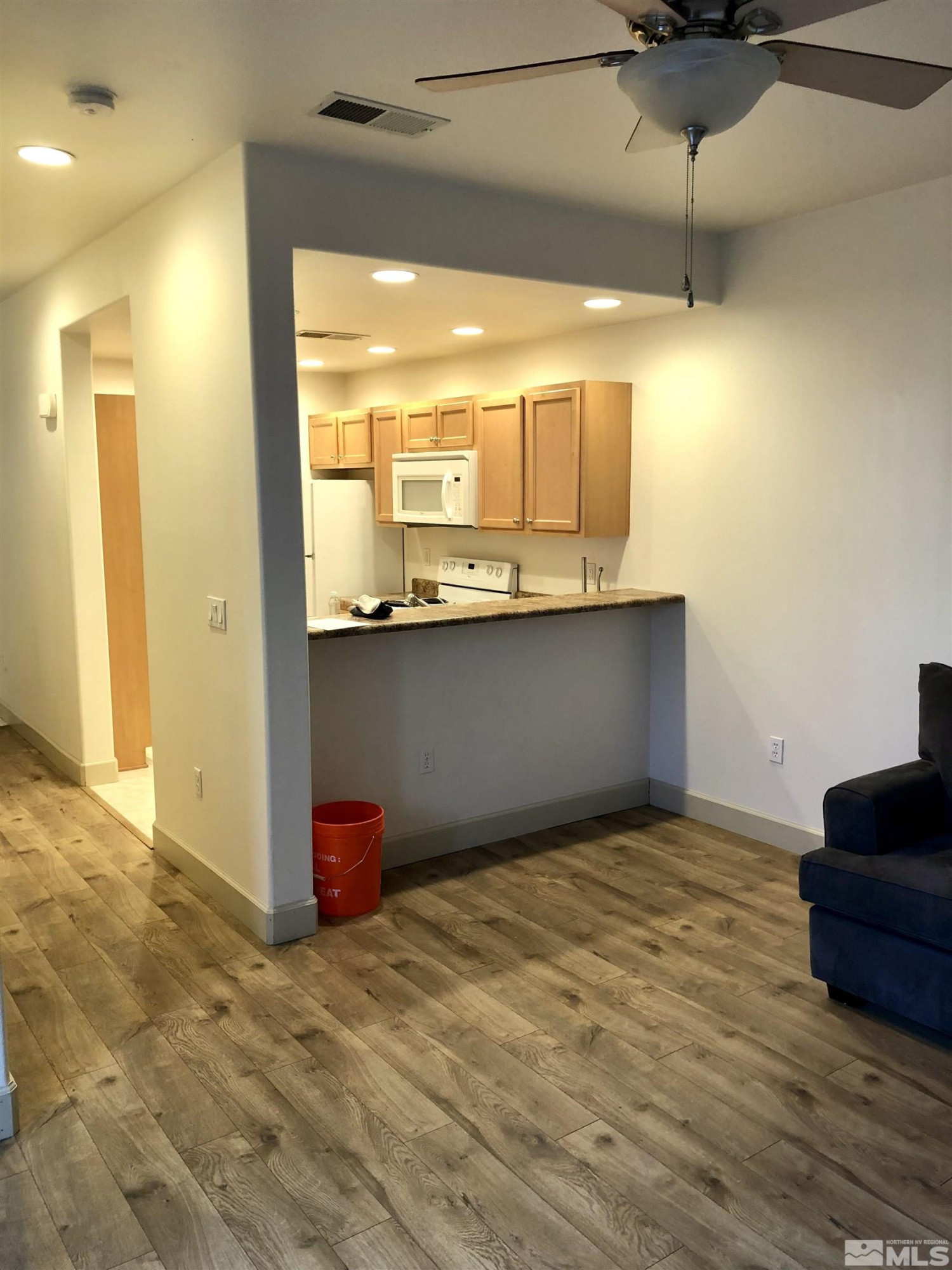326 East 7th Street Reno, NV 89512 - Photo 8 of 21 a view of a kitchen with a sink and cabinets