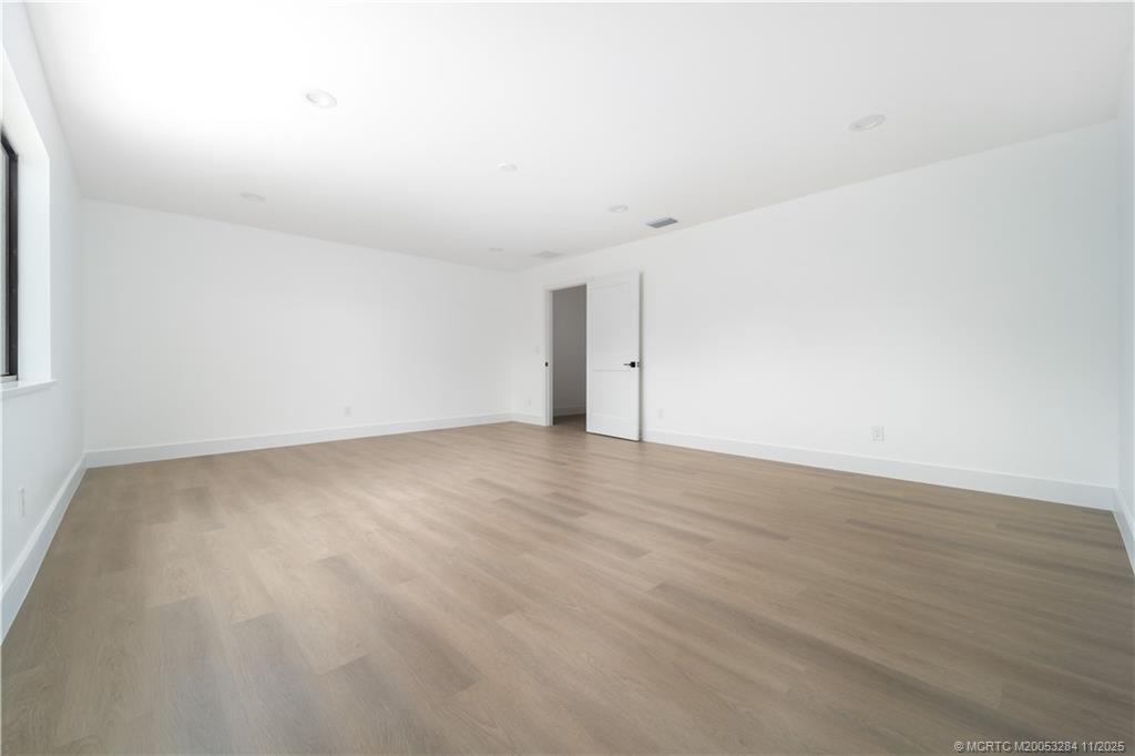 5549 Southeast Normandy Avenue Stuart, FL 34997 - Photo 13 of 21 a view of an empty room