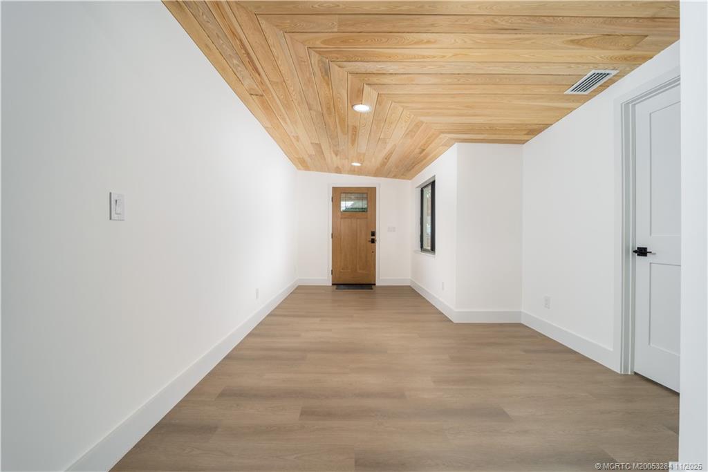 5549 Southeast Normandy Avenue Stuart, FL 34997 - Photo 3 of 21 a view of an empty room