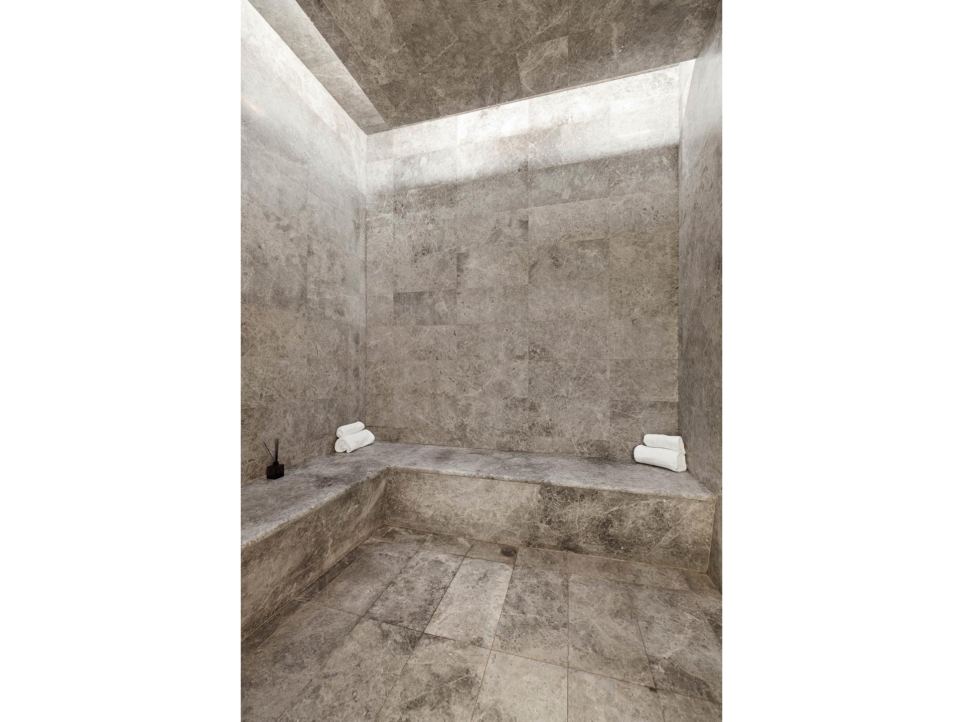 611 West 56th Street, Unit 3A Manhattan, NY 10019 - Photo 18 of 23 a bathroom with a toilet and a shower