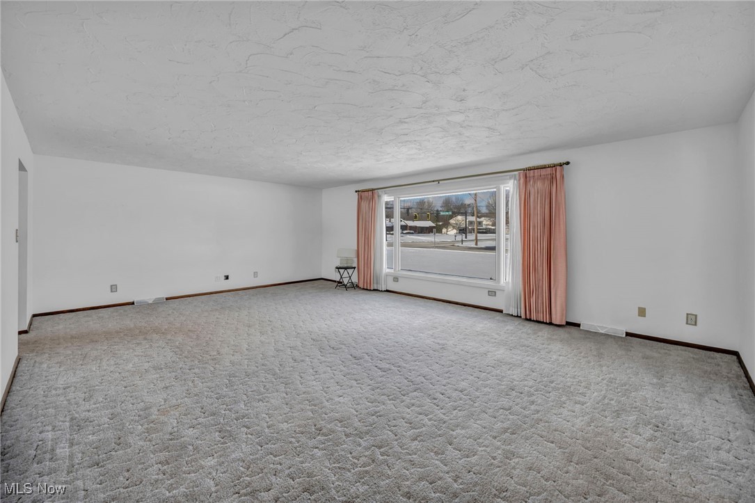 36350 Bainbridge Road Solon, OH 44139 - Photo 4 of 38 Very large living room with front window which allows for an immense amount of natural light