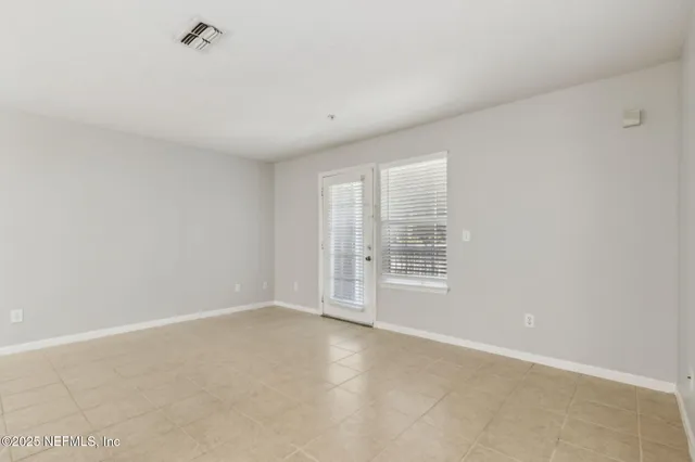 a kitchen with a refrigerator stove and microwave