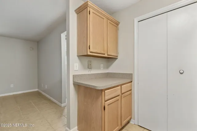 a bathroom with a toilet sink and shower