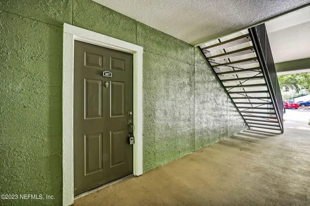 a view of a bathroom with a sink and a vanity